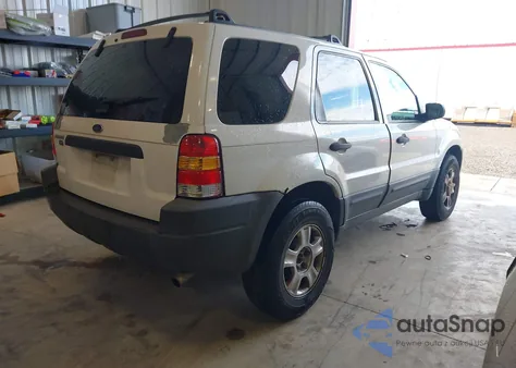 2003 Ford Escape Xlt from USA, damaged, VIN 1FMYU93103KA68531